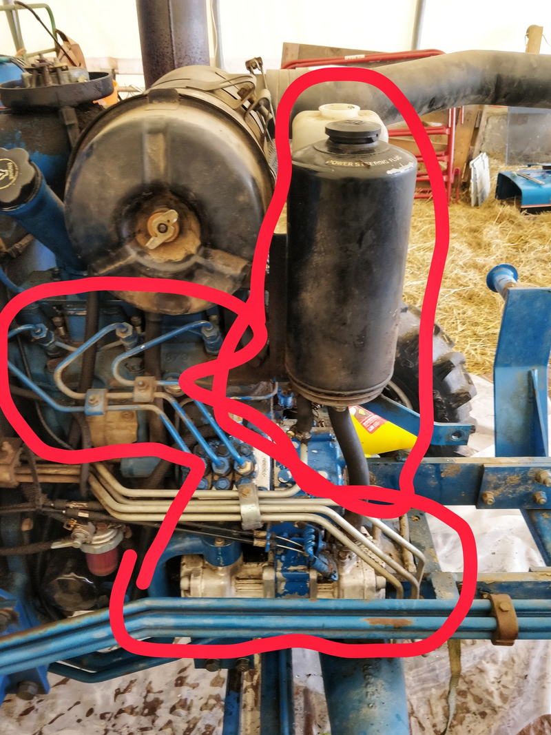 The injection pump and fuel lines also have to come off, since it’s driven by the timing gear, and i’m replacing the timing cover gasket. Oh yeah, and the power steering, which is a separate sub-hydraulic system.